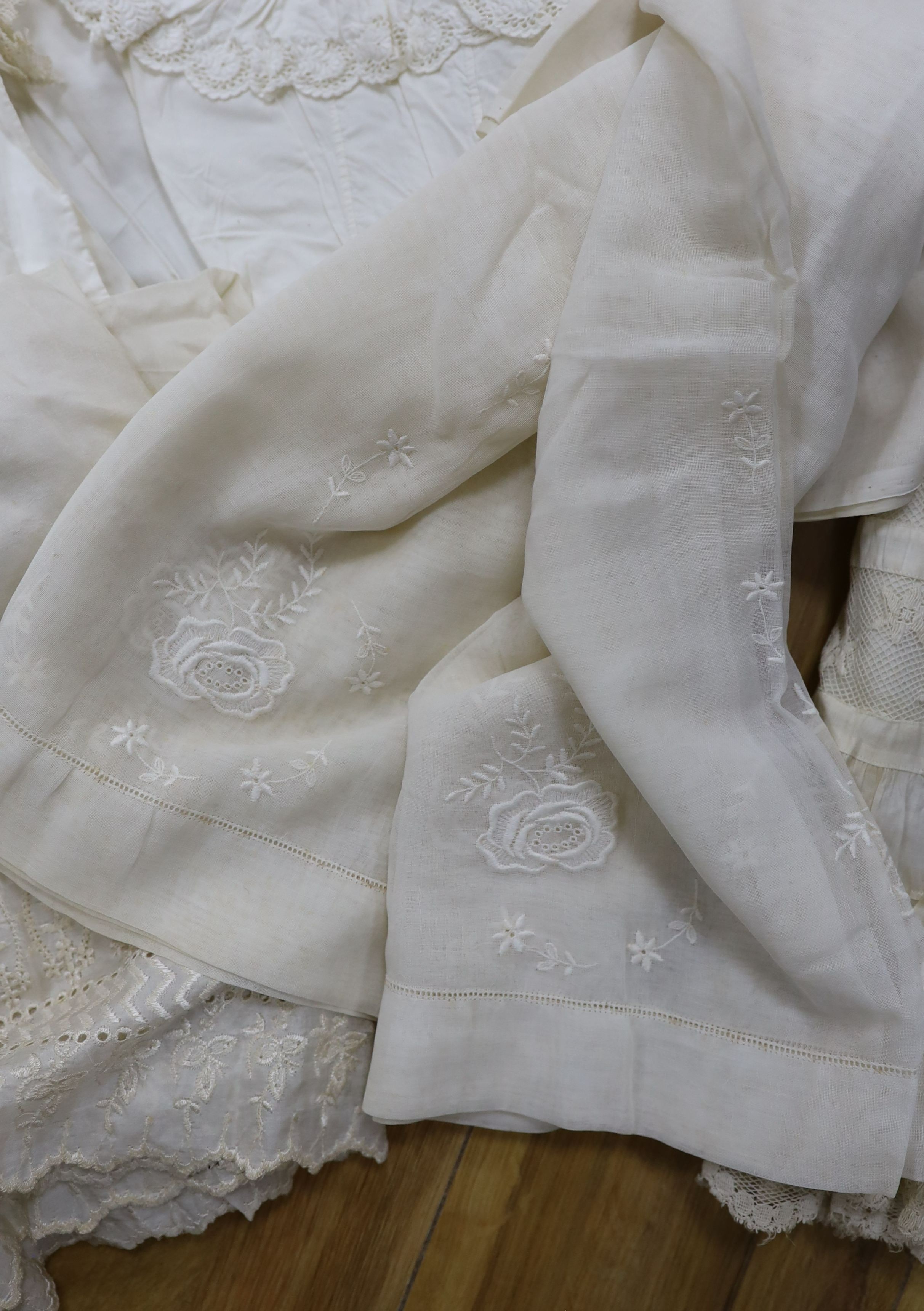 A collection of chemise/pantaloon lace inserted undergarments and a collection of petticoat flounces